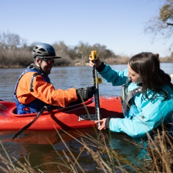 Erin Jim using Kayak for river rafting